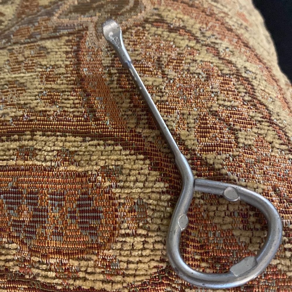 Old fashion bottle opener